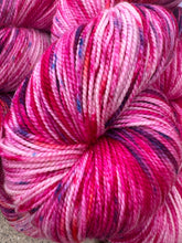 Close-up of pink and red skein of yarn